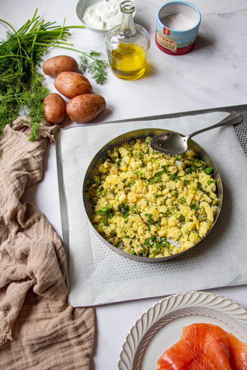 Mixture of crushed potatoes and herbs for the potato tart base