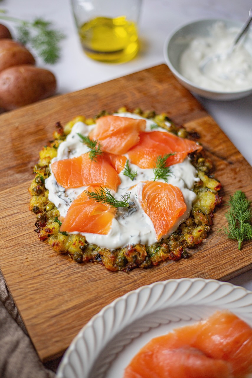 Golden potato tart base topped with yogurt and smoked salmon