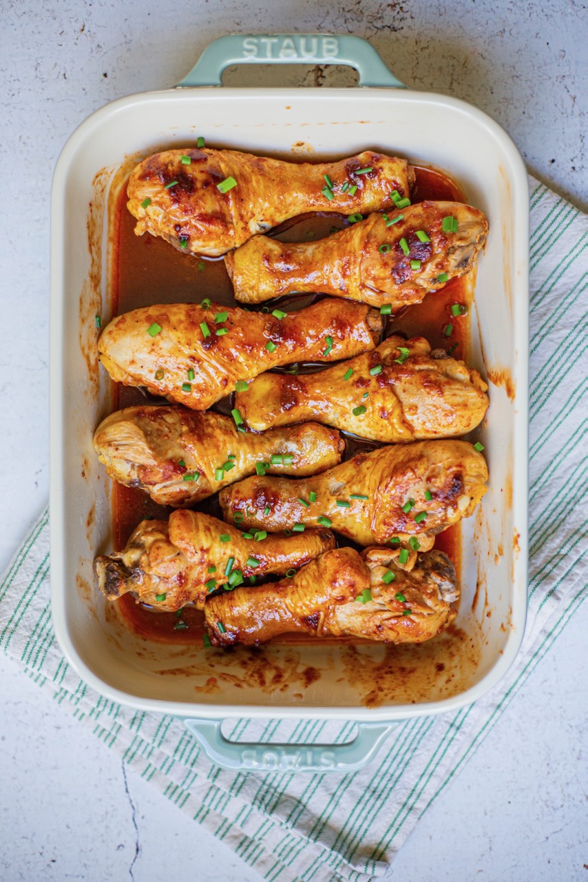 Grilled and caramelized barbecue sauce marinated chicken drumsticks